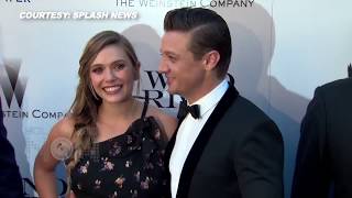 Elizabeth Olsen & Jeremy Renner PDA At 