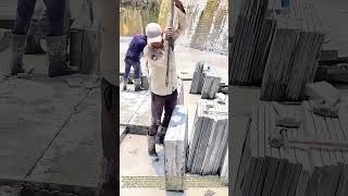 Cleaving Rough Rock: How Laborers Break Large Bluestone Into Compact Pieces With Steel Pry Bars