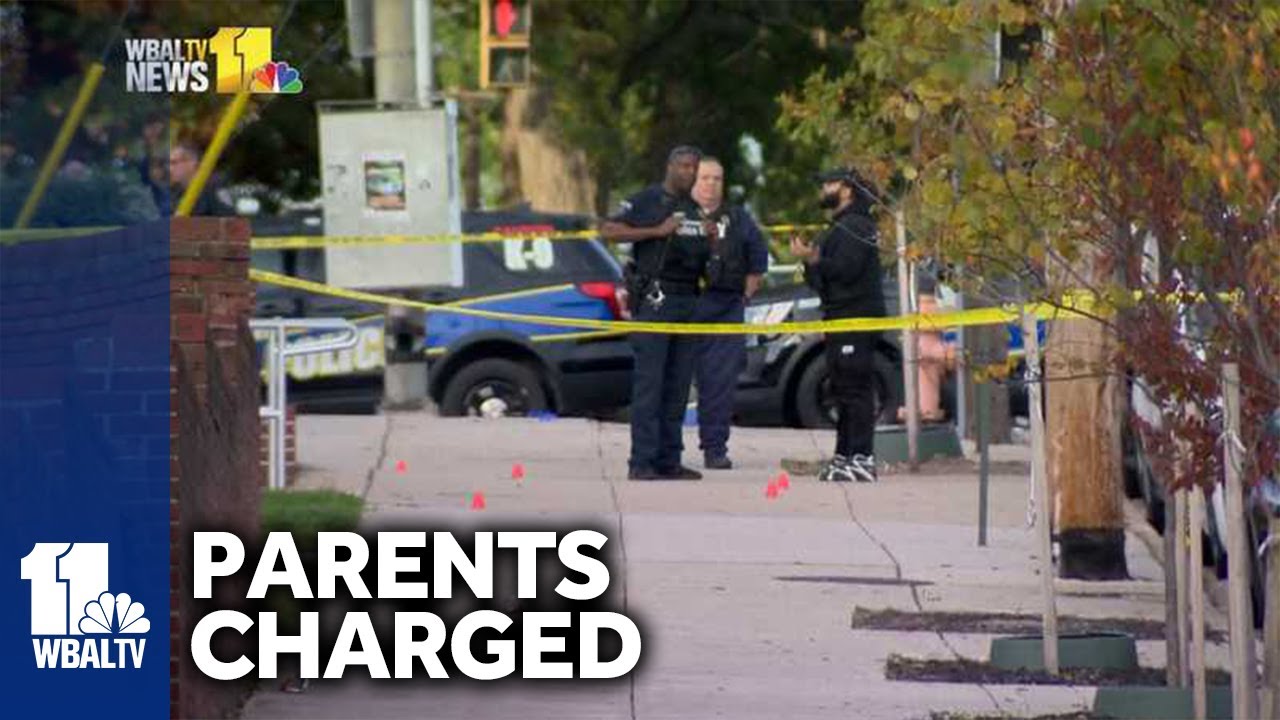 Parents charged after assault at Baltimore high school - YouTube
