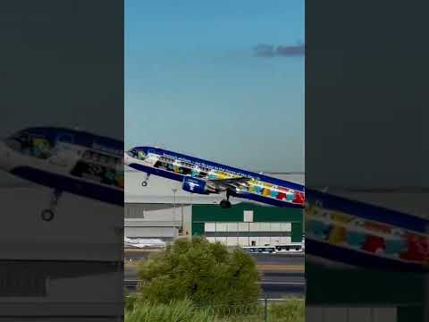 Brussels airlines with the smurfs livery departing from Lisbon Airport