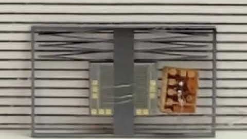 A Jumping Silicon Microrobot With an Energy Storing Substrate Spring - Real Time