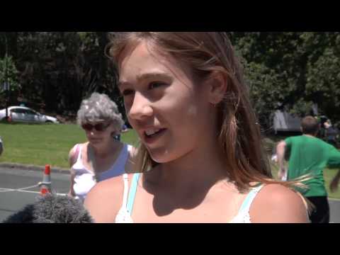 Emily Travers talks to some punters attending the Heineken Open 2011 finals. David Ferrer shirtless.