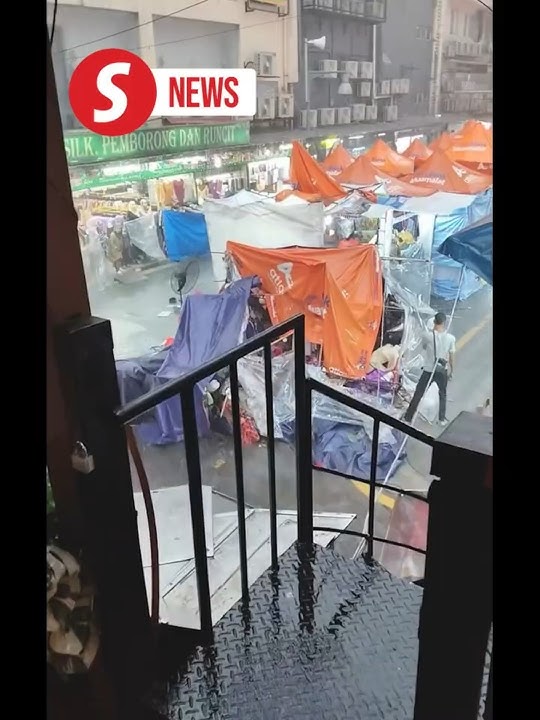 Severe downpour wreaks havoc and damaged tents of Ramadan bazaar traders on Jalan TAR