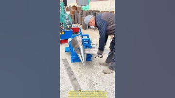 Master Craftsman Rolling a Cone Bucket with Precision.