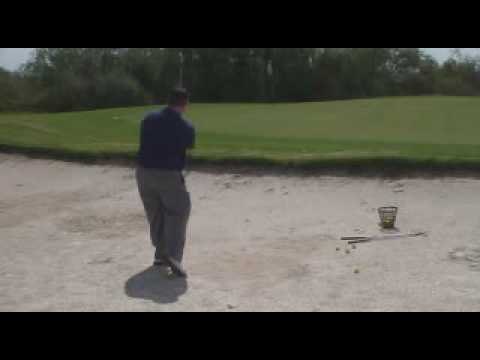 Golf Pro Gary Balliet shows sand trap swing form