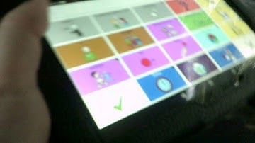 Adult with Autism answering questions using coughdrop AAC