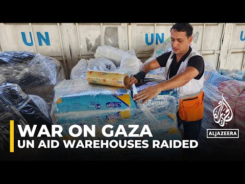 Palestinians break into gaza un aid warehouses as toll tops 8,000