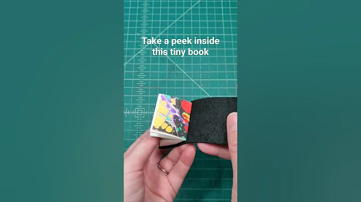 Tiny book // Look inside this miniature book #tinybook #miniaturebook #bookbinding #marbledpaper