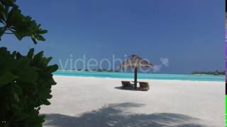 Palapa And Sunbeds By Sea On Maldives Beach 5 - Stock Footage | VideoHive 15488745