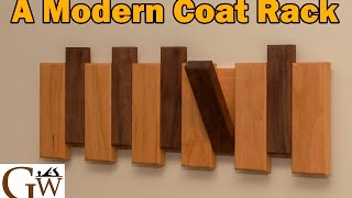 Build a modern looking coat rack. Sharing this video would be appreciated! Tilting router fence plans: http://www.garagewoodworks.
