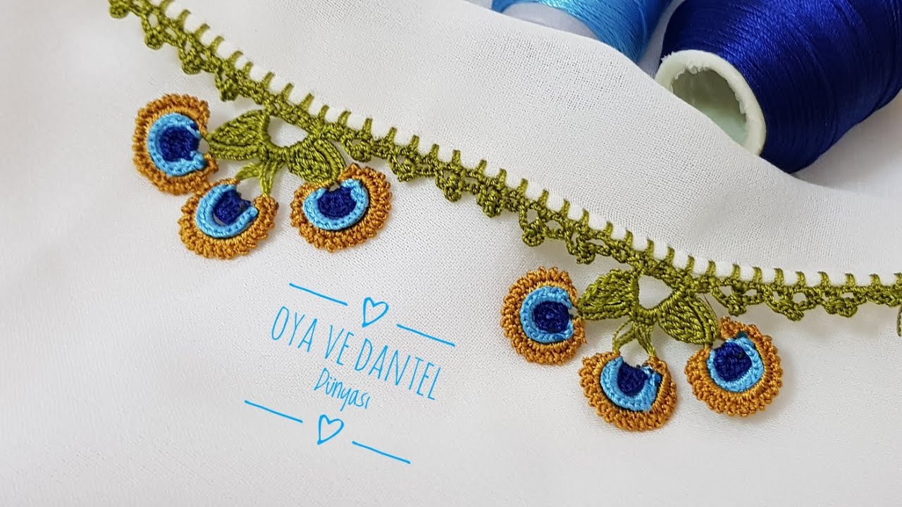 1846 Sanki Bu Modelde Tavus Kuşu Tüylerini Açmış Boncuk Tanesi Gibi Tığ Oyası Yapımı