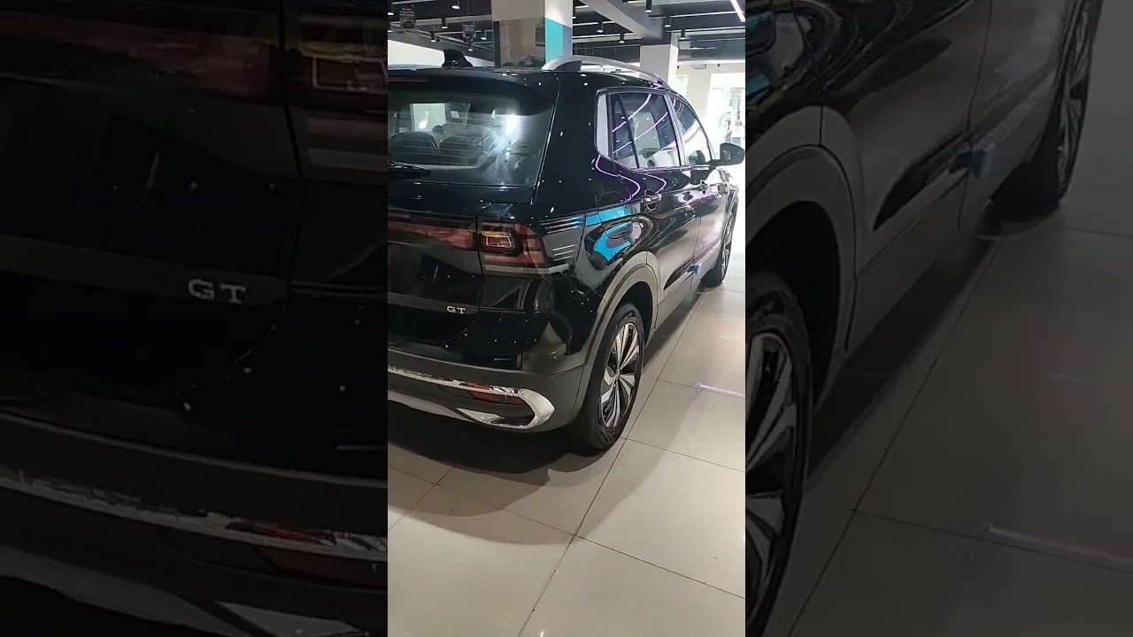 Watch Taigun GT Plus 1.5 TSI EVO DSG Deep Pearl Black  colour