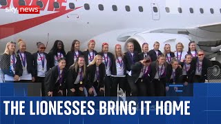 Fans greet England as they arrive home after historic Euros win