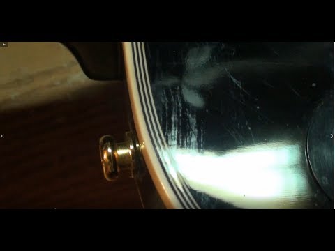 how to remove scratches from guitar finish by Randy Schartiger