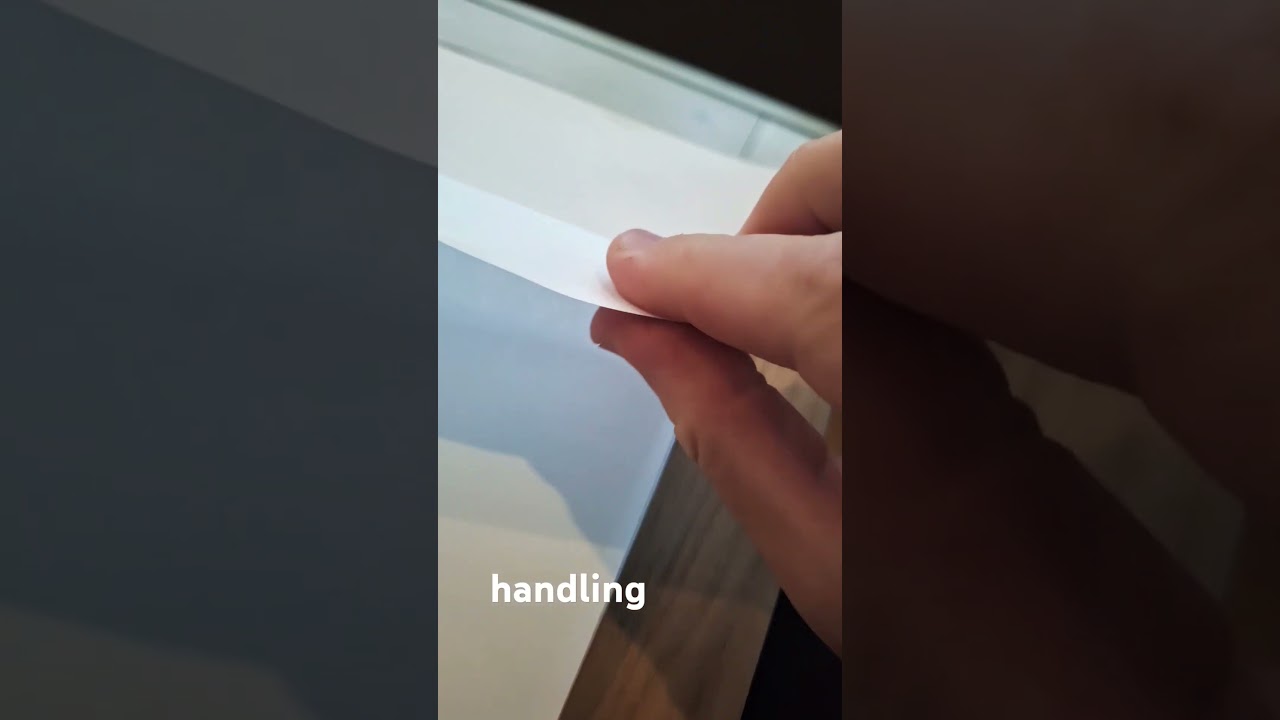"sheet grip" Grasping a sheet with two fingers. Handling paper.