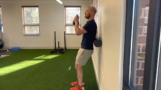 Foam Roller Goblet Wall Squat
