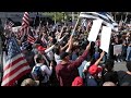 Hundreds of protesters and counterprotesters clash at Boise City Hall with police in the middle