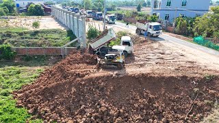 Starting New Project Landfill By Komatsu D20P Dozer Pushing Soil And 5Ton Dump Truck Unloading Soil