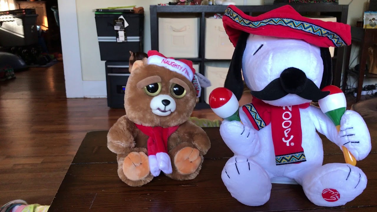 Feisty Pet’s Ebenezer Claws and Snoopy singing “Feliz Navidad”