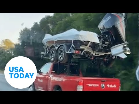 Weird things you see on the highway: Truck tows boat on roof | USA TODAY