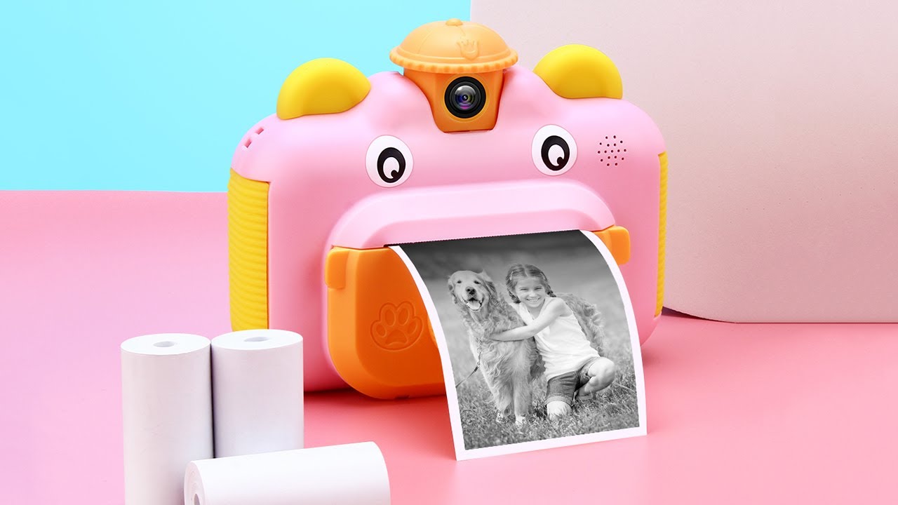 как вставить бумагу в детский фотоаппарат моментальной