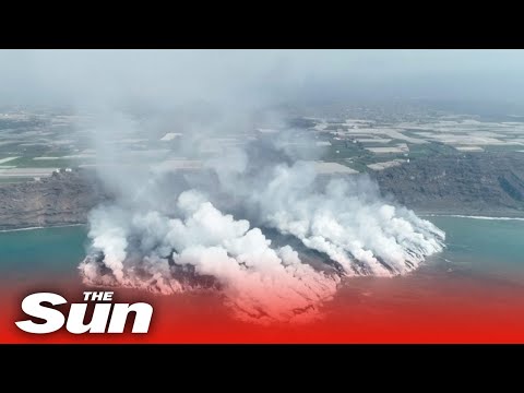 Epic drone vid of La Palma volcano creating new land mass
