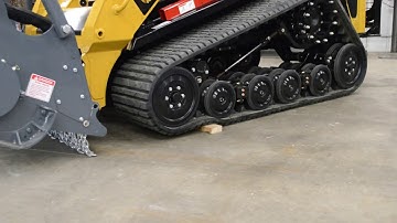 ASV’s Posi-Track undercarriage sheds a piece of steel pipe