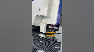 Demonstrate CNC punching machine-door lock technology to foreign customers on site#cnc #punching