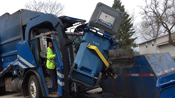 McNeilus front loader with curotto can ll on recycle