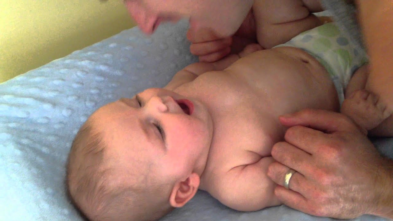 Eli laughing with Daddy