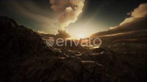 Sun Rays Over Mountains in a Valley | Motion Graphics - Envato elements