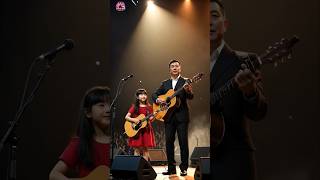 #FatherDaughter#FatherDaughterDuet#FamilyPerformance#LiveOnStage#GuitarPerformance#AcousticVibes