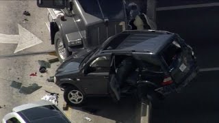 News In 90: Collision Leaves Car Hanging Off Overpass