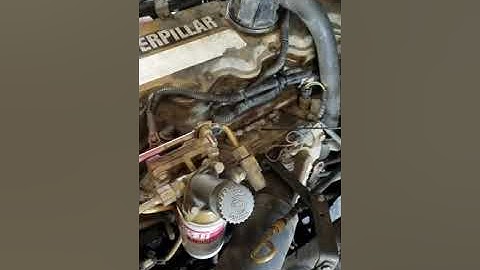 Removal of injector bolt from oil pan. 3126 cat engine, injector sleeve, step by step, Part 8