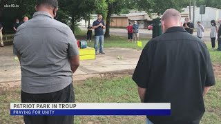 Community prays for unity at Troup's Patriot Park