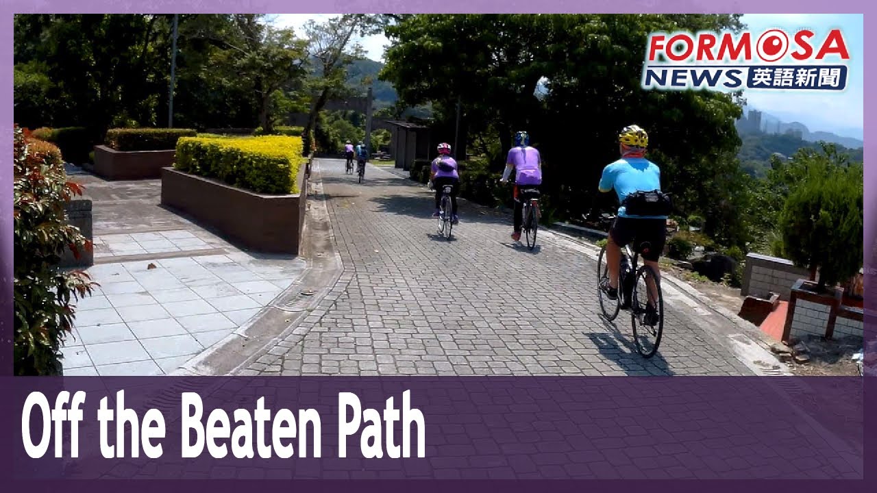 Bike club takes cyclists off the beaten path with tours of Taipei’s cemeteries