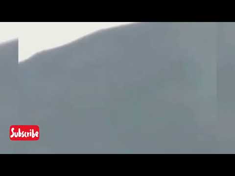 Huge, Long Tubular Shape Craft Slowly Flying Over The Great Wall Of China @UFO NEWS