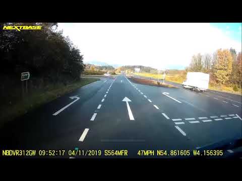 Shocking moment van hurtles towards oncoming traffic on the wrong side of busy road