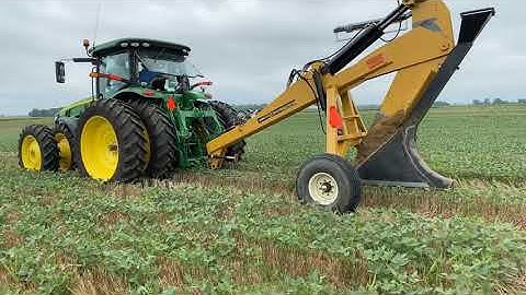Installing your own field drainage tile with Soil Max Gold Digger tile plow/John Deere Tractor