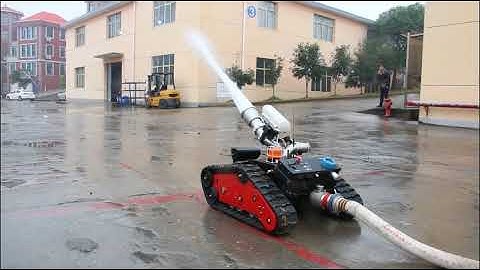 Remote control fire fighting robot and fire extinguisher monitor