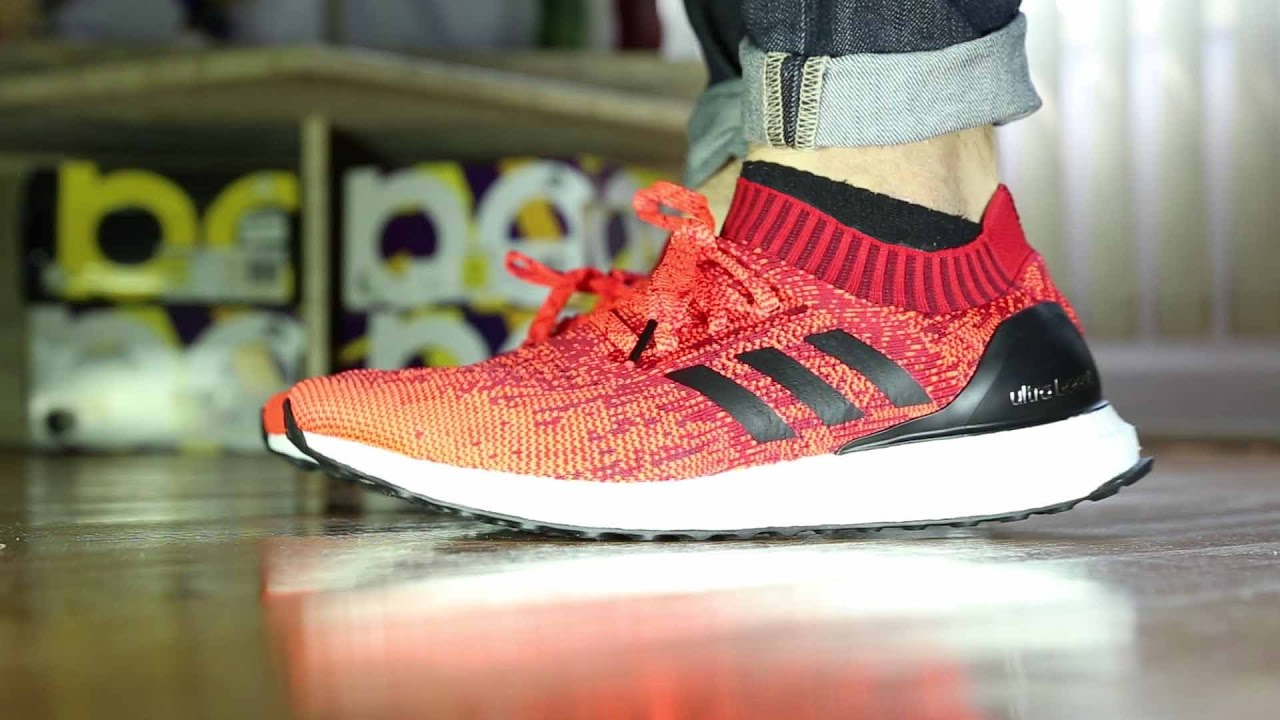 uncaged ultra boost red on feet