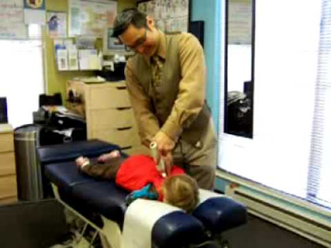 Kailey, 2yo, has a preventive chiropractic adjustment