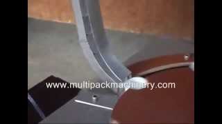 MULTIPACK : Cap Lining machine - wad fixing machine