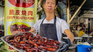 A humble roadside stall in Kuala Lumpur hides authentic and delicious roast meat and noodle dishes