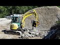 An mbc50 crusher bucket at work in a natural park in slovenia