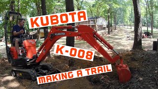 KUBOTA K-008-3 Mini Ex Digging a small embankment