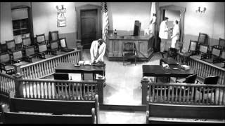 Atticus Finch walks out of the court after Tom Robinson is found guilty