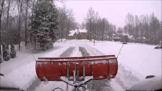 plowing snow with new holland ls190