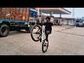 how to do a wheelie on a cycle