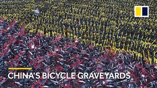 Drone footage shows thousands of bicycles abandoned in China as bike sharing reaches saturation